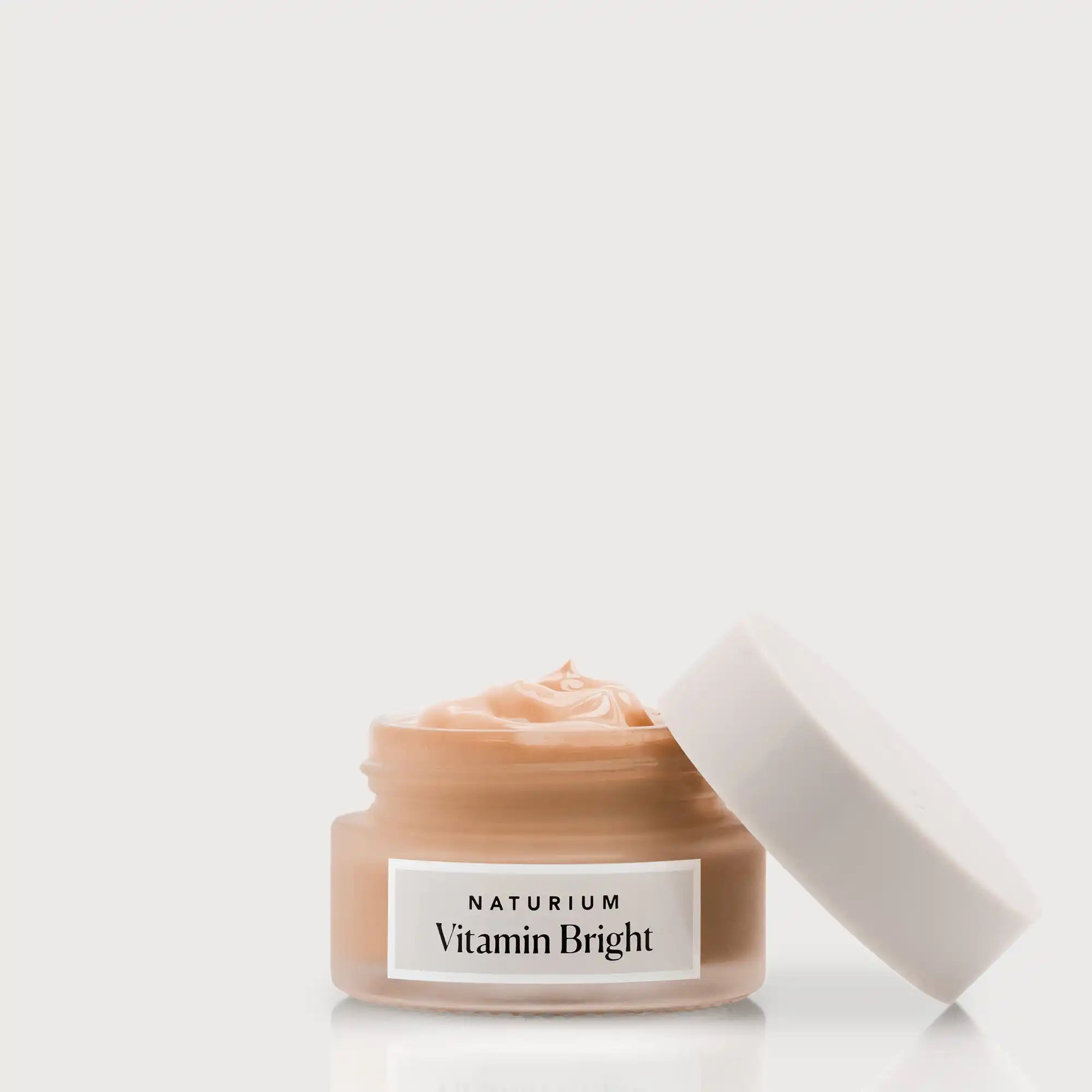 vitamin-bright-illuminating-eye-cream-o2 NATR-VitaminBright_DEEP_Primary_front_openjar_bone.webp