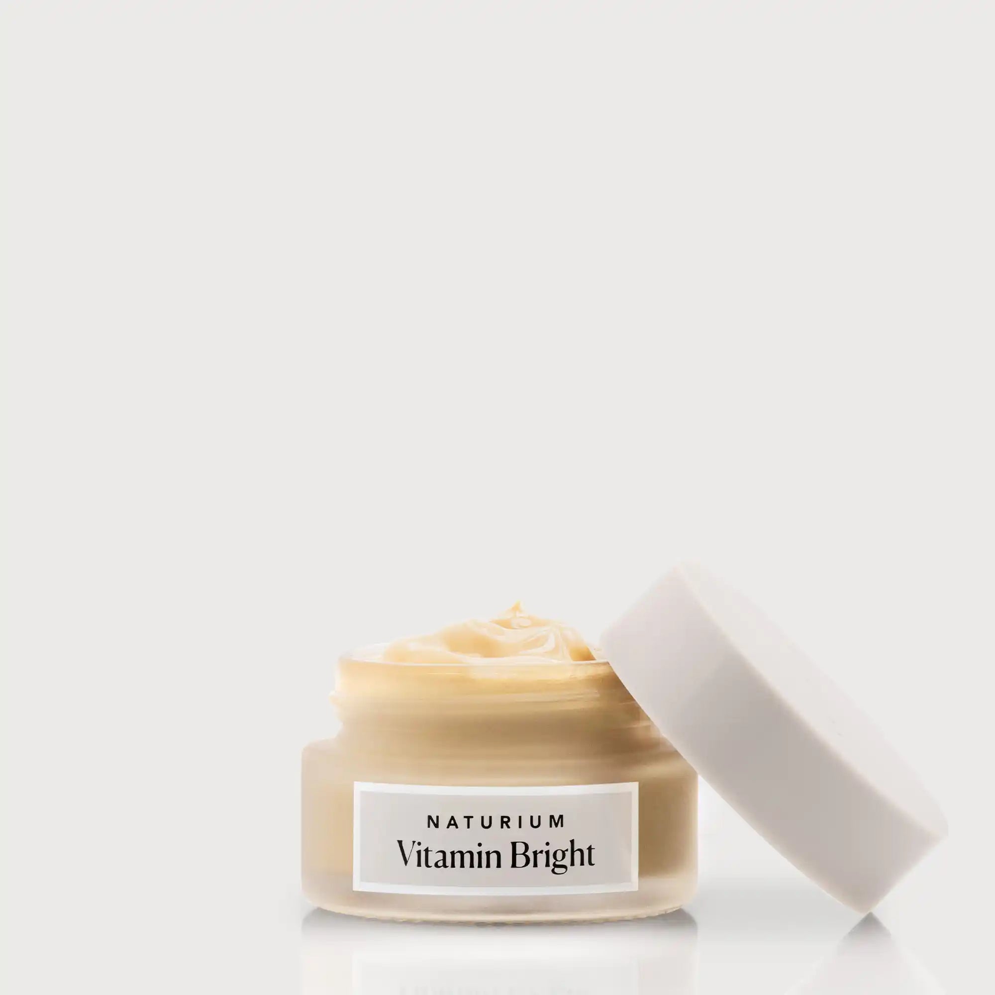 vitamin-bright-illuminating-eye-cream-o2 NATR-VitaminBright_LIGHT_Primary_front_openjar_bone.webp